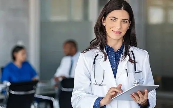 A doctor holding digital tablet