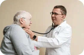 Photo of doctor with elderly patient